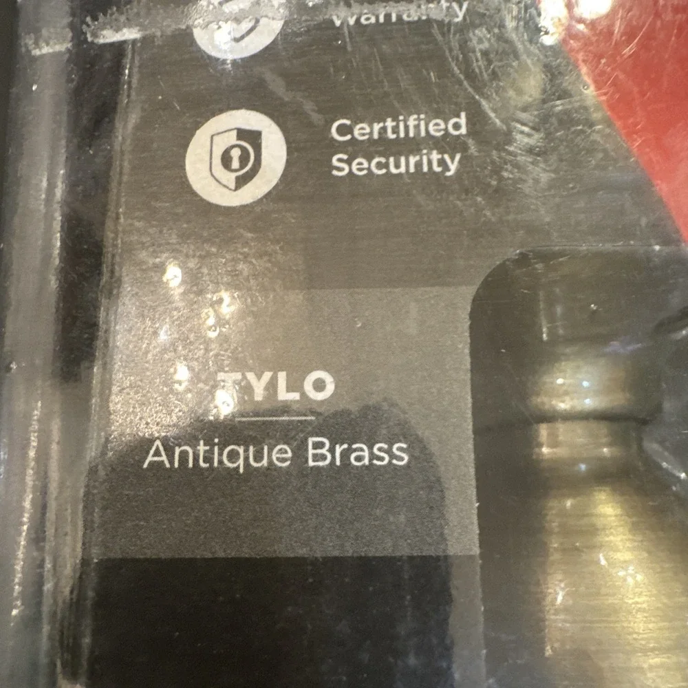 Kwikset‎ Tylo Front Entry Door Knob 94002-827 Antique Brass